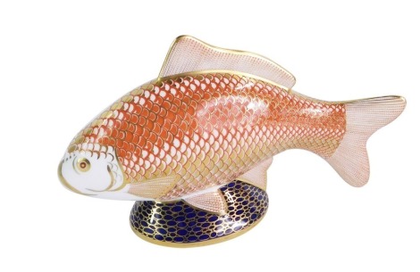 A Royal Crown Derby Golden Carp paperweight, silver stopper, No LI, 11cm high, boxed.