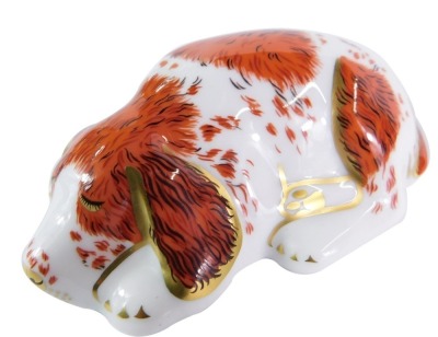 A Royal Crown Derby Puppy paperweight, Collector's Guild 2000, gold stopper, 9cm wide.