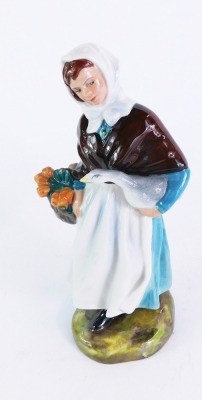 A Royal Doulton porcelain figure modelled Country Lass, HN1991, 19cm high.