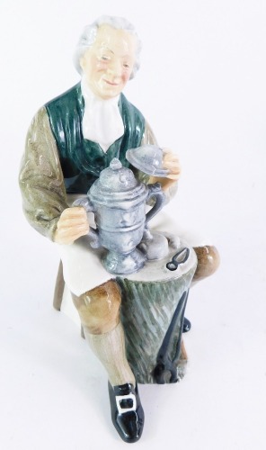 A Royal Doulton porcelain figure modelled as The Tinsmith, HN2146, 16cm high.