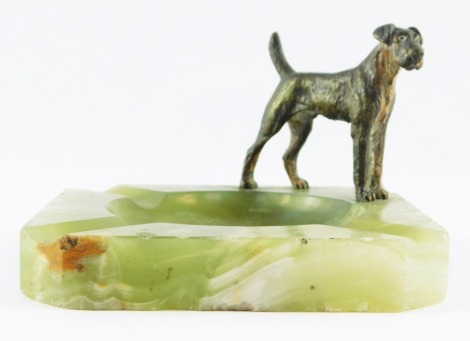 An 1950's onyx ashtray, with cast figure of a dog, 8cm high, on 12cm x 12cm base. (AF)