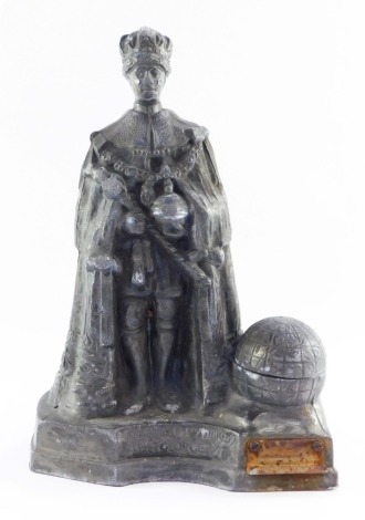 A cast Coronation of King George VI table strike lighter, modelled standing in Coronation robes, aside a globe, 23cm high. (AF)