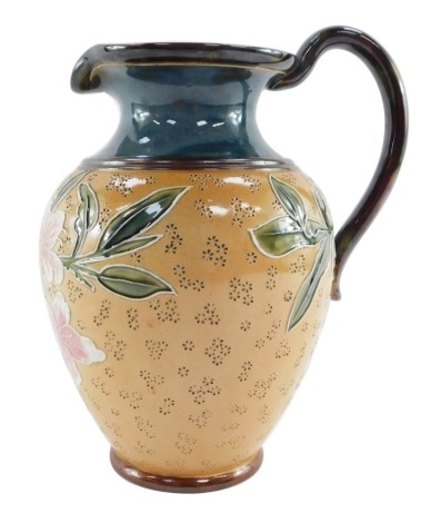 A Royal Doulton late 19thC stoneware jug, Art Union of London, with a blue glazed interior, decorated externally with white and pink blossom, no 6158, impressed marks, 19cm high.