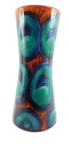 A Poole Pottery Flamboyance hour glass vase, 34cm high.