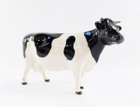A Beswick Friesian cow, CH Claybury Leegwater, model 1362A, 12cm high.