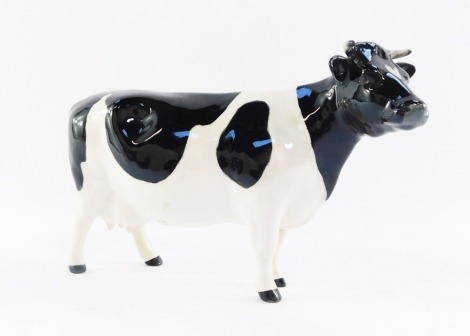 A Beswick Friesian cow, CH Claybury Leegwater, model 1362A, 12cm high.