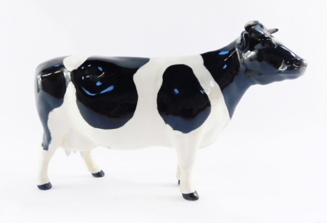 A Beswick Friesian cow, CH Claybury Leegwater, model 1362A, 12cm high.