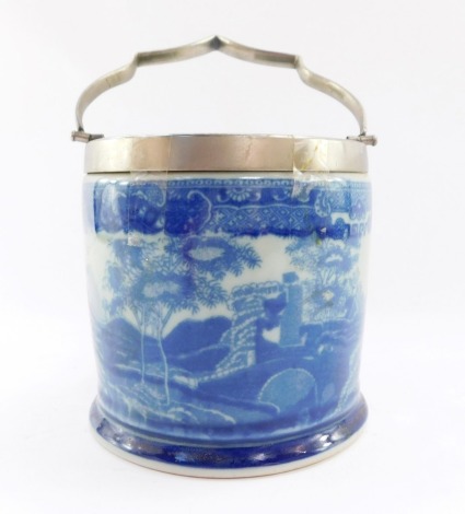 A blue and white ironstone biscuit barrel, with chrome trimmings, with blue and white figures and buildings, 13cm high.