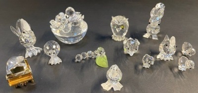 A group of Swarovski crystal ornaments, comprising squirrel, goose (x2) duck, owl, piano, cockerel, chicken, chicks, caterpillar, chicks in basket, penguin, all boxed. (10)