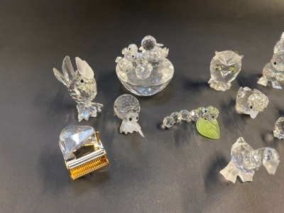 A group of Swarovski crystal ornaments, comprising squirrel, goose (x2) duck, owl, piano, cockerel, chicken, chicks, caterpillar, chicks in basket, penguin, all boxed. (10) - 2