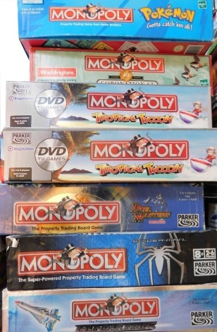 Seven themed Monopoly sets, comprising Pokemon., Coronation Street., Tropical Tycoon (x2)., Duel Masters., Spiderman and Thunderbirds.