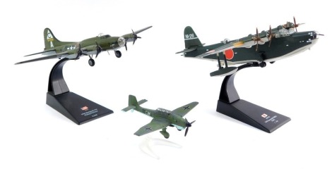 Three die cast aircraft, scale 1:44, comprising a 1944 Boeing B17F Flying Fortress, 1943 Kawanishi H8K2 Emily, and a Focke-Wulf. (unboxed)