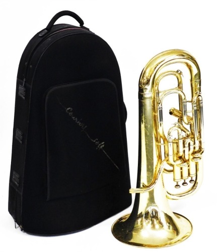 An Antoine Courtois brass tuba, Challenger model, 66cm wide, in carrying case.