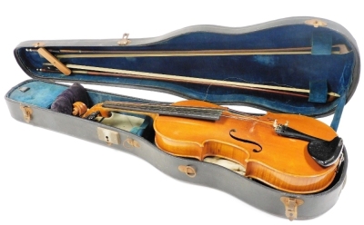 An early 20thC violin, with a two piece back, lacking label, length of back 37cm, and two violin bows, cased.