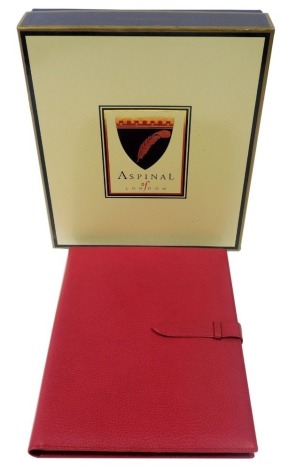 An Aspinal of London red leather document sleeve, to fit A4 paper, boxed.