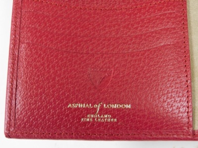 An Aspinal of London red leather document sleeve, to fit A4 paper, boxed. - 2