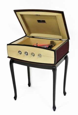 A 1960's Pye stereophonic projection system record player, type 1005, on a hardwood stand, 70cm high, with operating handbook.