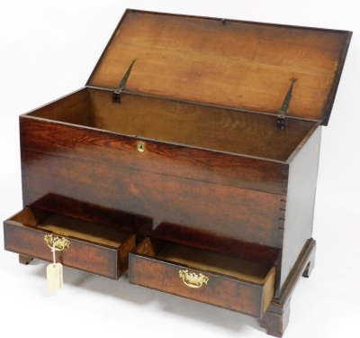 An 18thC oak mule chest, the hinged lid enclosing a vacant interior above two drawers, on bracket feet, 69cm high, 104cm wide, 52cm deep. - 2