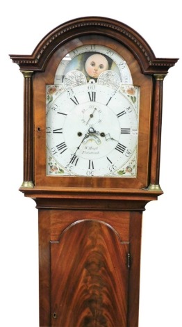 W. Hough, Portsmouth. A 19thC flame mahogany long case clock, with an arched moon phase dial, decorated with floral spandrels, chapter ring bearing Roman and Arabic numerals, subsidiary seconds dial and date aperture, with an eight day four pillar, two tr