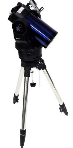 A Mead Maksutov-Cassegrain telescope, ETX-125, in a brushed steel case, with tripod stand in a canvas bag.