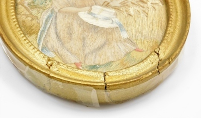 A 19thC silk embroidery of a girl with bonnet in wheat field, 13cm x 17cm, in an oval gilt frame. (AF) - 2