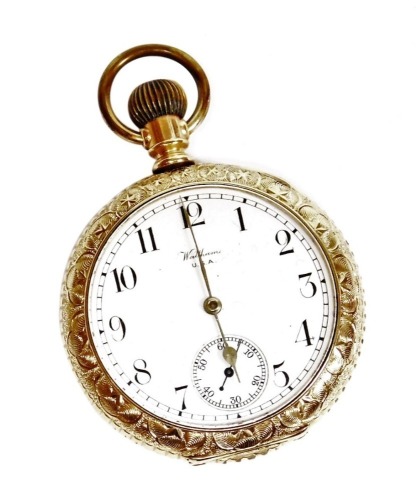 A Waltham USA gold plated pocket watch, the outer dial with heavily embossed floral detailing and depiction of building and flowers to reverse, with white enamel dial and seconds dial with silvered hands, bezel wind, the dial 4cm wide.