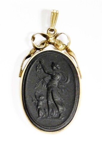 A Wedgwood black basalt pendant, in a silver frame with bow top, with Neo Classical female figure, 3.5cm high, 5.4g all in.