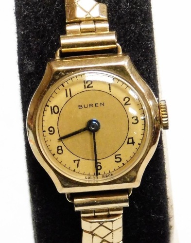 A Buren lady's 9ct gold wristwatch, the circular watch head stamped 375, on an expanding stainless steel and plated bracelet, the dial 2cm wide, in a W Mansell of Lincoln box.