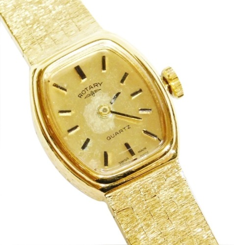 A Rotary gold plated lady's wristwatch, with oval shaped dial, on Brocade and bark effect type bracelet, 18cm long, boxed.