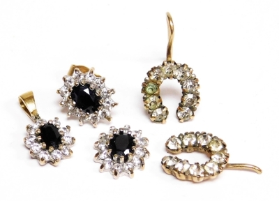 A group of jewellery, to include a pair of 9ct gold imitation diamond set horseshoe earrings (1 AF), together with a set of 9ct gold sapphire and cz set earrings with matching pendant, 3.2g all in. (AF)