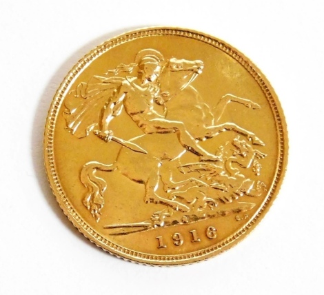 A George V half gold sovereign, dated 1916.