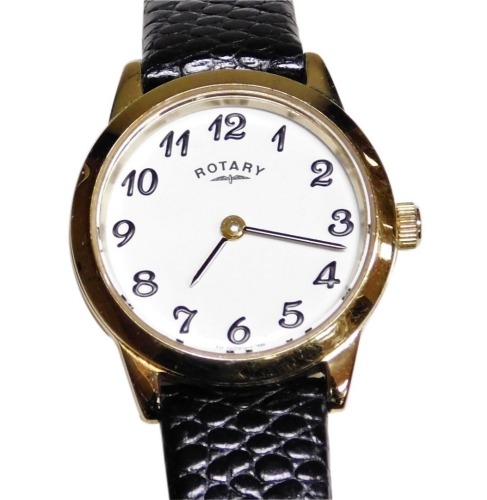 A Rotary lady's wristwatch, with gold plated dial, on black leather strap.