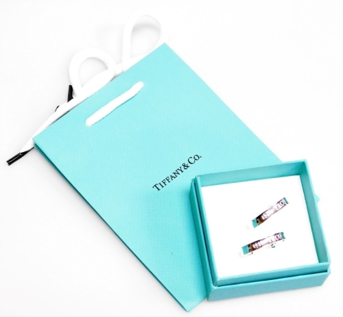 A pair of Tiffany style hoop earrings, dated 1997, white metal stamped 925, with butterfly backs, 7.1g, with box and bag.