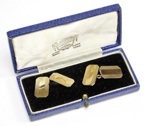 A pair of gold plated gentleman's cufflinks, each with rectangular panel with striped detailing and central chain link, in a MM Henderson Limited case.