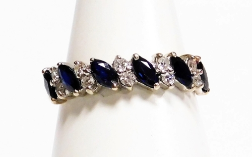 A 9ct gold sapphire and diamond half hoop dress ring, the half hoop detailing set with oval cut sapphires in claw setting, with two tiny diamonds, ring size Q, 3.2g all in, boxed.