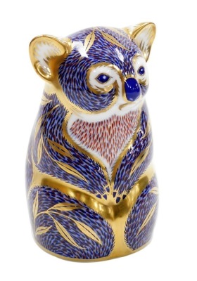 A Royal Crown Derby koala porcelain paperweight, with gold stopper and red printed mark to underside, 11cm high, boxed.