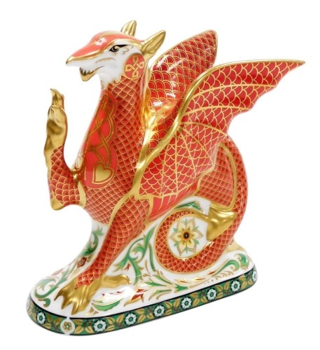 A Royal Crown Derby Welsh Dragon porcelain paperweight, to celebrate the marriage of HRH Prince William to Catherine Middleton, 29th April 2011 at Westminster Abbey, limited edition number 479/950, with gold stopper and gold printed marks to underside, 15