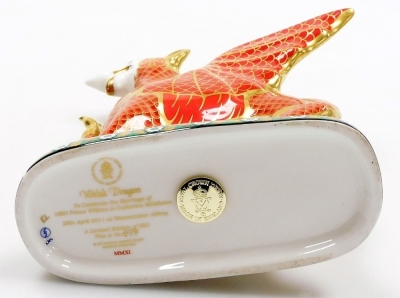 A Royal Crown Derby Welsh Dragon porcelain paperweight, to celebrate the marriage of HRH Prince William to Catherine Middleton, 29th April 2011 at Westminster Abbey, limited edition number 479/950, with gold stopper and gold printed marks to underside, 15 - 3