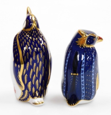 A Royal Crown Derby penguin porcelain paperweight, limited edition number 457/500, with silver stopper, 13cm high, boxed, and a Rock Hopper penguin, designed by John Ablitt, with gold stopper and red printed marks to underside, 10cm high, boxed. - 2