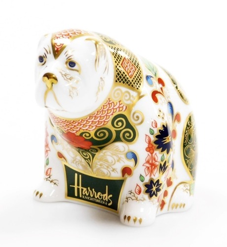 A Royal Crown Derby Harrods Bulldog porcelain paperweight, specially commissioned by Harrods, limited edition number 431/500, with gold stopper, signed Sue Rowe, with red printed marks to underside, 8cm high, boxed with certificate.