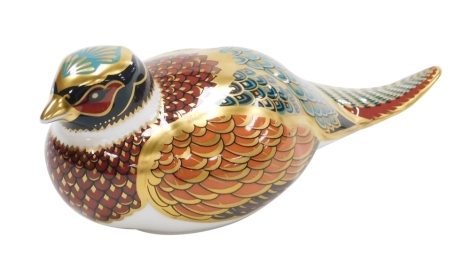 A Royal Crown Derby Woodland Pheasant porcelain paperweight, an exclusive for the Royal Crown Derby Collectors Guild, with gold stopper and red printed marks to underside, 19cm wide, boxed.