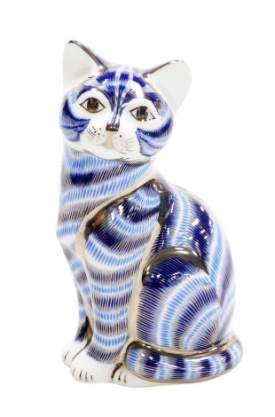 A Royal Crown Derby Silver Tabby Cat porcelain paperweight, special edition available until 31st December 2008, with gold stopper and red printed marks to underside, 13cm high, boxed with certificate.