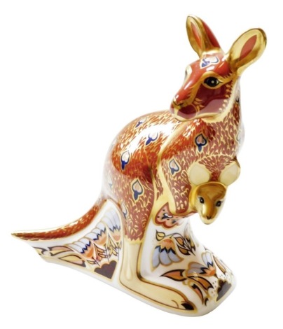 A Royal Crown Derby Kangaroo porcelain paperweight, from The Australian Collection, one of a signature edition limited to availability to the end of 2000, with gold stopper and gold printed marks to underside, 15cm high, boxed with certificate.