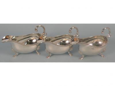 A set of three silver sauce boats in mid 18thC style