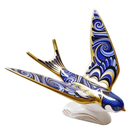 A Royal Crown Derby Swallow paperweight, with gold stopper and grey printed marks to underside, 17cm wide, boxed.