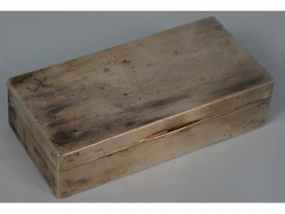 A silver rectangular sandwich box