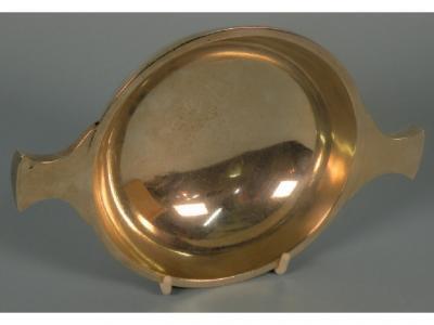 A silver quaich with tapering handles