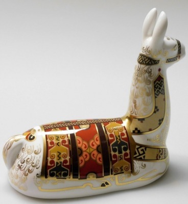 A Royal Crown Derby Llama porcelain paperweight, an exclusive for The Royal Crown Derby Collectors Guild, with gold stopper and gold printed marks to underside, 15cm wide, boxed. - 2