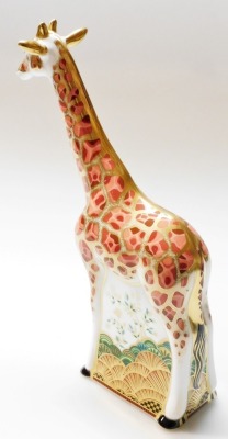 A Royal Crown Derby Masai Giraffe porcelain paperweight, special edition for Goviers of Sidmouth, designed by J James, limited edition number 515/950, with gold stopper and red printed marks to underside, 26cm high, boxed with certificate. - 2