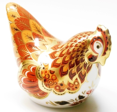 A Royal Crown Derby Bantam Hen porcelain paperweight, limited edition pre release number 265/450, with gold stopper and gold printed marks to underside, 8cm high, boxed with certificate.